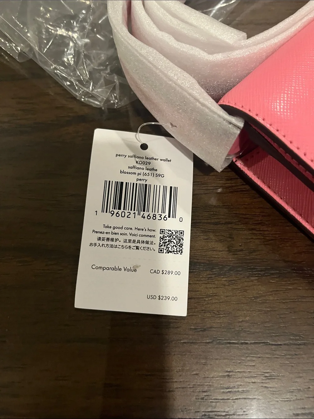 kate spade pink crossbody bag with gold logo